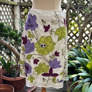 Trucco A-line Skirt.  Flowers  appliqué on off white background.  Size 38 US-6-8